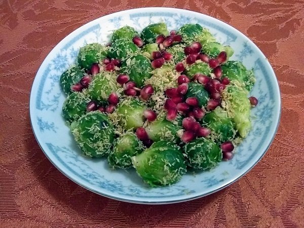 Steamed Brussels Sprouts with Shredded Wheat and Pomegranate Seeds